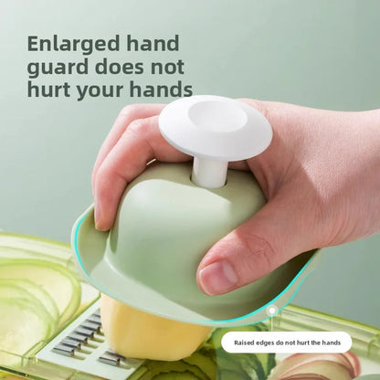 Household kitchen multi-functional slicing and shearing integrated vegetable cutting artifact