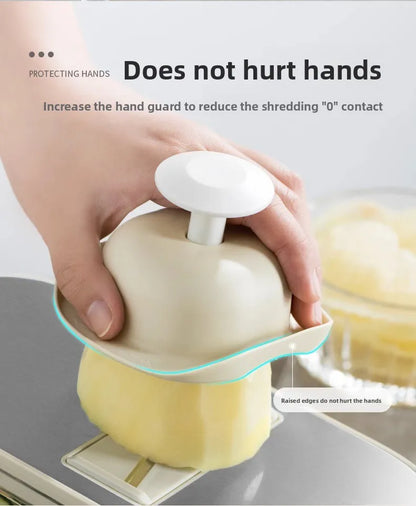 Household kitchen multi-functional slicing and shearing integrated vegetable cutting artifact