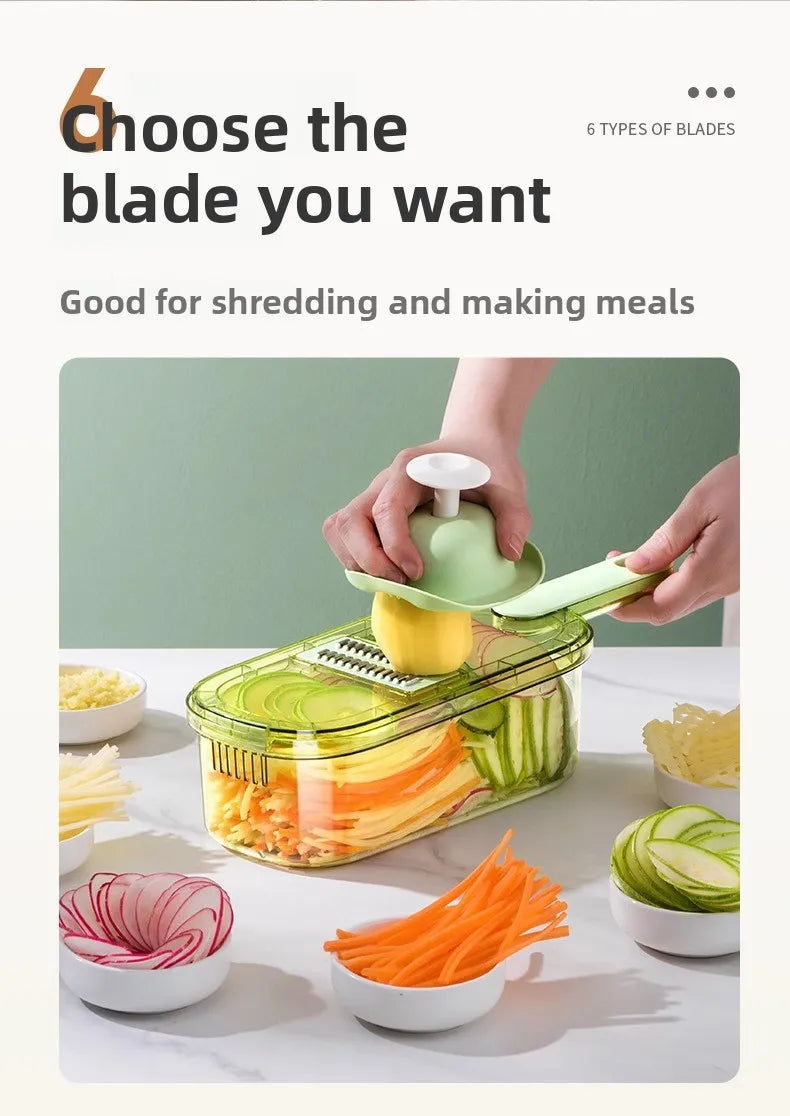 Household kitchen multi-functional slicing and shearing integrated vegetable cutting artifact