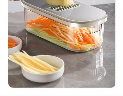 Household kitchen multi-functional slicing and shearing integrated vegetable cutting artifact