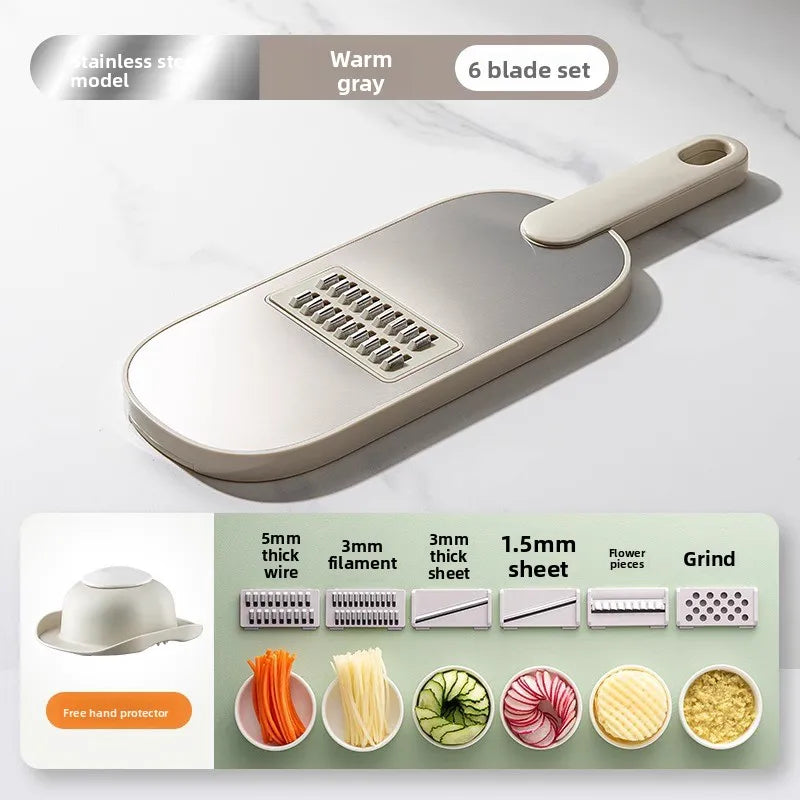 Household kitchen multi-functional slicing and shearing integrated vegetable cutting artifact