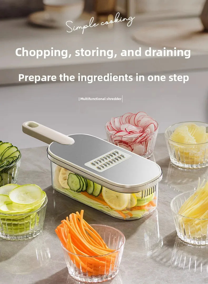 Household kitchen multi-functional slicing and shearing integrated vegetable cutting artifact