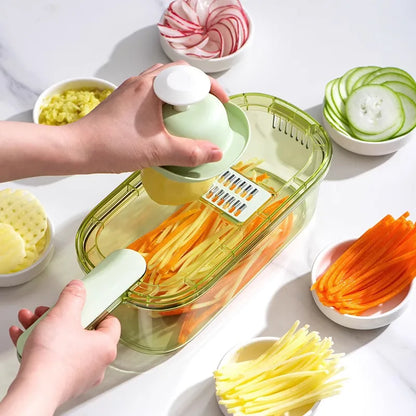 Household kitchen multi-functional slicing and shearing integrated vegetable cutting artifact