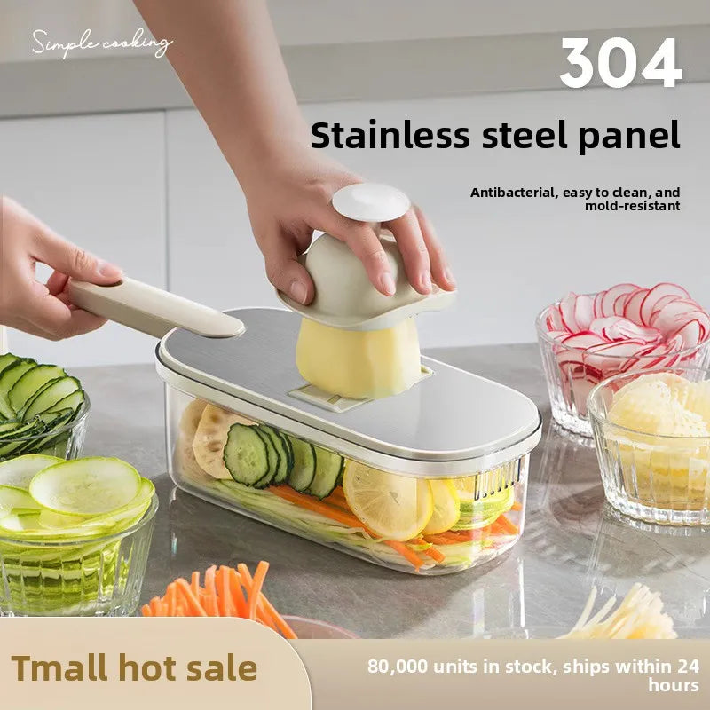 Household kitchen multi-functional slicing and shearing integrated vegetable cutting artifact