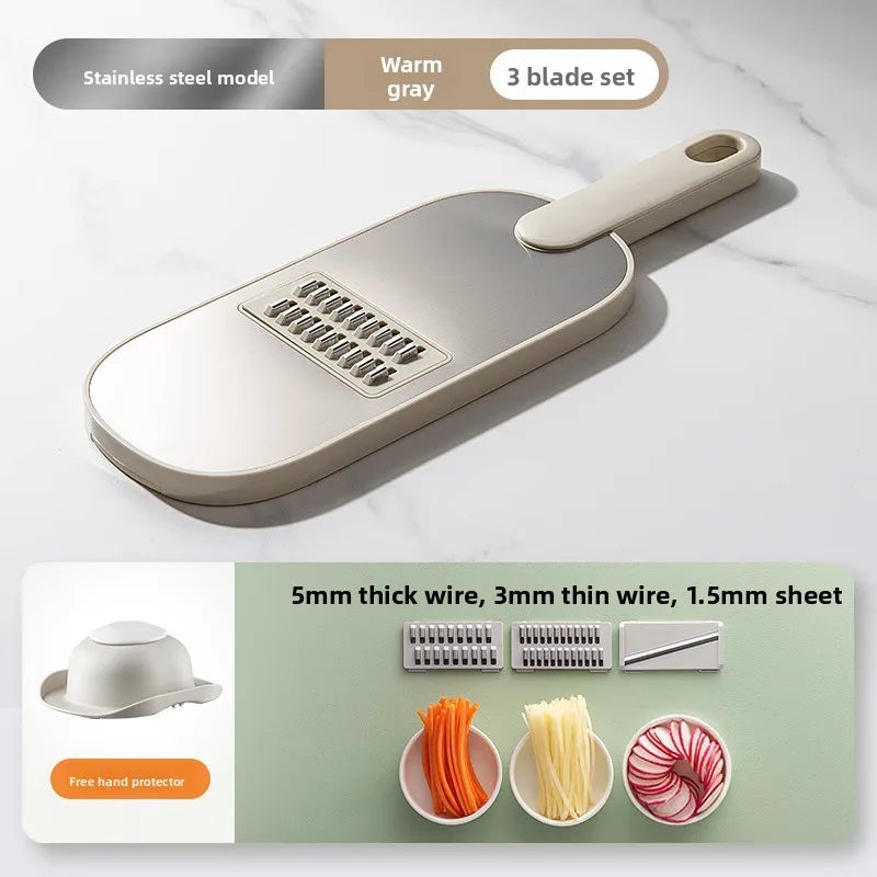 Household kitchen multi-functional slicing and shearing integrated vegetable cutting artifact