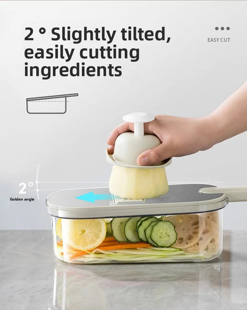Household kitchen multi-functional slicing and shearing integrated vegetable cutting artifact